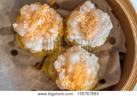 Chinese dim sum Shumai - Steamed Chinese groumet cuisine