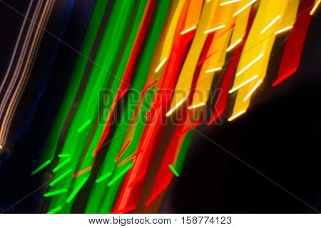 Abstract background made of Christmas lights with long exposure.