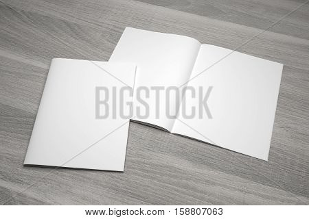 Blank open composition letter format magazine mockup with cover showcase on wood texture. 3D illustration mockup.