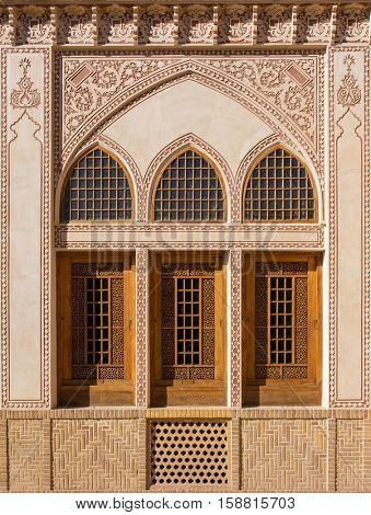 Beautiful wall with a traditional persian ornament in Khan-e Ameriha historic house in Kashan, Iran