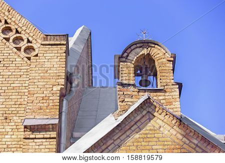 Belfry of the Church in Vepriai in Lithuania on a cloudless day