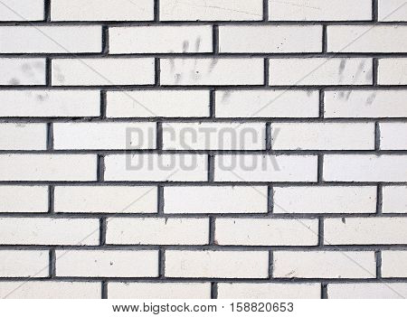 The texture of a brick wall with hand print
