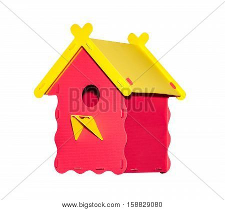 Plastic birdhouse of red color isolated on white background