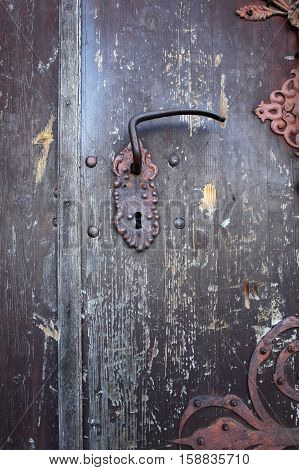 Rusting lock door handle on the old the front door
