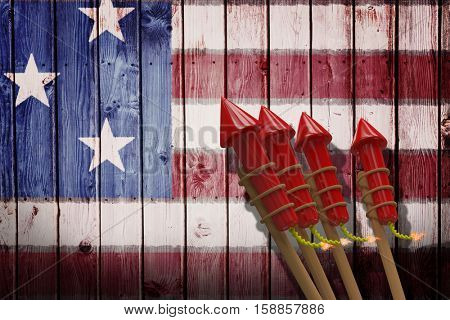 3D Rockets for fireworks against composite image of usa national flag