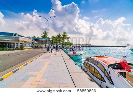 MALE, MALDIVES - October 04 :  Boats at the harbor next to Ibrahim Nasir International Airport in Male, Maldives.