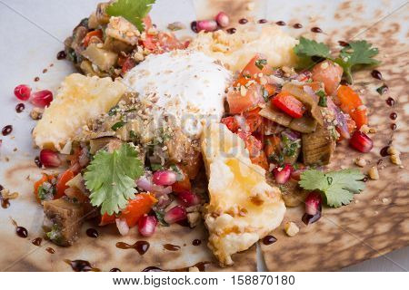 Midle east salad with mushrooms and pomegranate