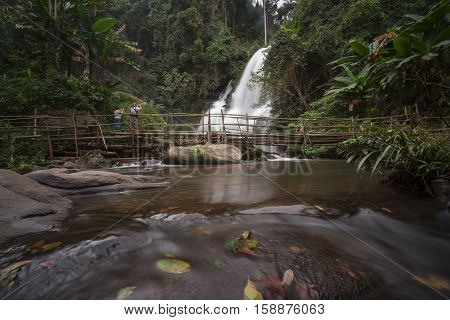 Motion blurred water of Pa Dok Siew Waterfall (Rak Jung waterfall ) beautiful waterfall in deep forest Doi Inthanon national park. Rainy season Chiangmai , Thailand