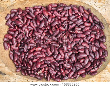 Background of the red shelled beans at the market close up. Shelled beans pattern close up.