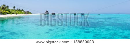 Panorama of tropical lagoon on the island in Indian Ocean. Maldives.