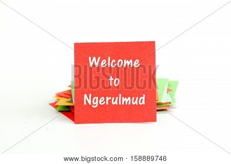 picture of a red note paper with text welcome to Ngerulmud