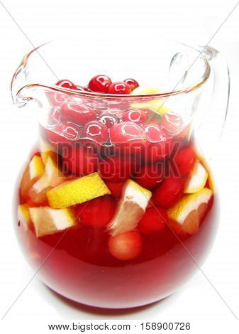 fruit cruchon cocktail punch in jug with ice and fruit