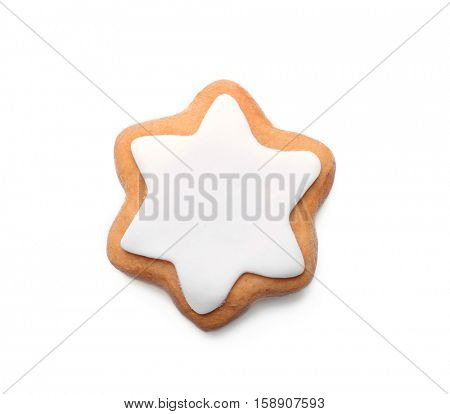 Tasty glazed cookie for Hanukkah, on white background