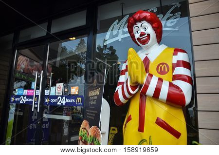 Ronald Mcdonald Character Near Entryway To Mcdonals Restaurant