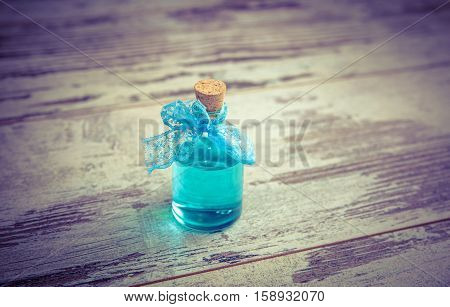 Blue Cologne In Small Bottle Toned
