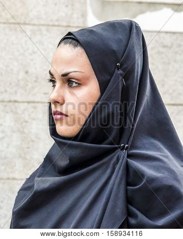 CAGLIARI, ITALY - May 1, 2013: 357 ^ Religious Procession of Sant'Efisio - Sardinia - portrait of a beautiful woman in the folk group of Isili