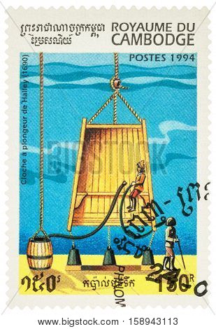 MOSCOW RUSSIA - NOVEMBER 28 2016: A stamp printed in Cambodia shows old diving bell of Edmond Halley (1690) series 