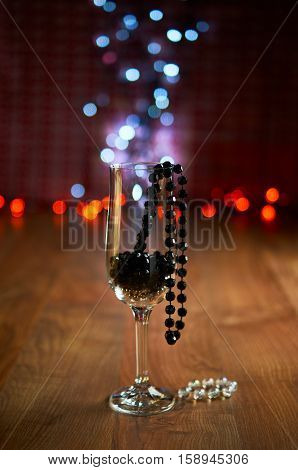 Glass Of Champagne And Beads