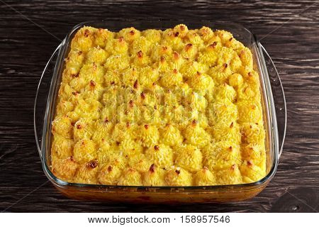 Traditional british shepard pie on wooden background.