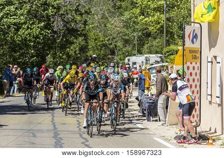 Mont Ventoux France - July 142016: The peloton riding on the road to Mont Ventoux during the stage 12 of Tour de France 2016.