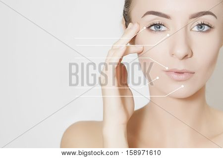 Closeup of female adult with marks on skin for cosmetic medical procedures