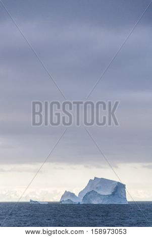 Antarctica in a cloudy day- Antarctic Peninsula - Palmer Archipelago - Neumayer Channel - Global warming - Fairytale landscape
