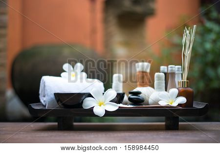 Spa massage compress balls herbal ball on the wooden with treaments spa Thailand select focus
