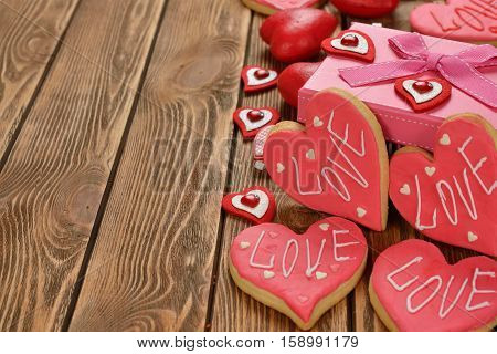 Festive cookies decorated with pink sugar mastic