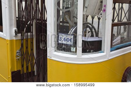 LISBON, PORTUGAL - October 1, 2016: Detail of the tram entry steering wheel and the exorbitant fare of a minute journey down the street in Lisbon Portugal