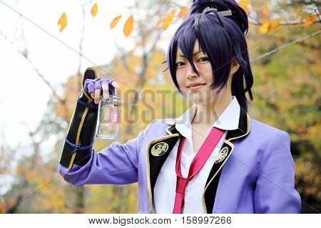 Marugame, Kagawa, Japan -  November 20, 2016: Young japanese girl dressed in cosplay costume at Mamugame-Jou Park. Photo taken in Marugame Cosplay Convention