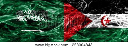 Saudi Arabia Vs Sahrawi Smoke Flags Placed Side By Side. Thick Colored Silky Smoke Flags Of Saudi Ar
