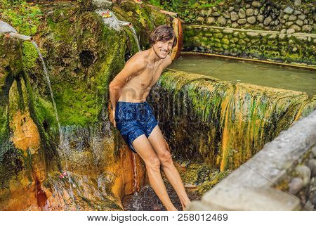 Man Tourist In Belulang Hot Springs In Bali, Village Mengesta, Penebel District, Tabanan Regency