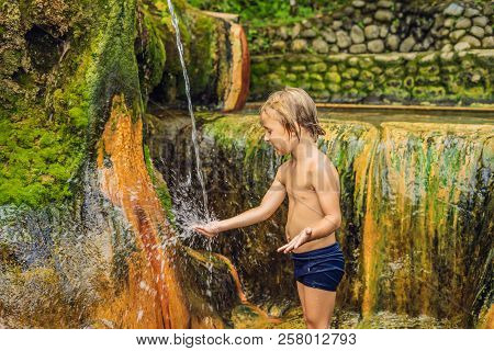 Boy Tourist In Belulang Hot Springs In Bali, Village Mengesta, Penebel District, Tabanan Regency Tra