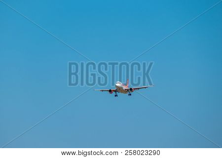 Zurich, Switzerland - July 19, 2018: Easyjet lowcost airlines airplane preparing for landing at day time in international airport
