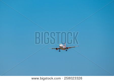 Zurich, Switzerland - July 19, 2018: Easyjet lowcost airlines airplane preparing for landing at day time in international airport