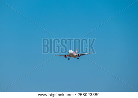 Zurich, Switzerland - July 19, 2018: Easyjet lowcost airlines airplane preparing for landing at day time in international airport