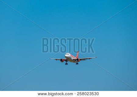 Zurich, Switzerland - July 19, 2018: Easyjet lowcost airlines airplane preparing for landing at day time in international airport