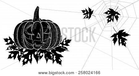 Halloween. 31 October. The Concept Of A Holiday. A Pumpkin With A Carved Terrible Face, Leaves With 