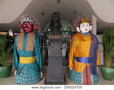 Jakarta, Indonesia - August 7, 2018: Statue Of Hr Rasuna Said Between Two Ondel-ondel Giant Puppets 