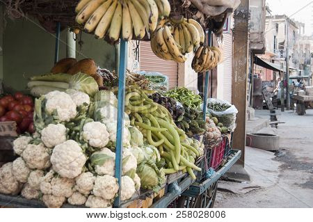 Various Fruits And Vegetables Displayed For Sale On A Atreet Market