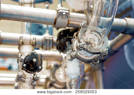 Chemical Industrial Equipment, Glass Tubes And Containers. Abstract Industrial Background.