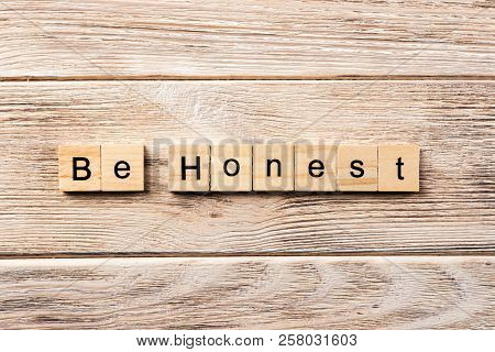 Be Honest Word Written On Wood Block. Be Honest Text On Table, Concept.