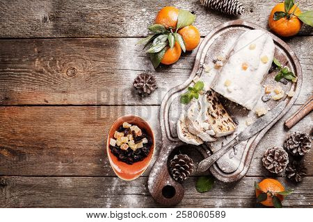 Christmas Stollen, Traditional German, European Festive Dessert Cut Into Pieces On Wooden Background