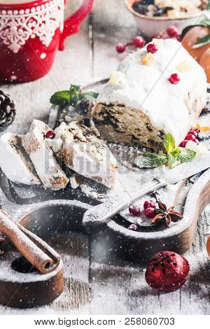 Christmas Stollen, Traditional German, European Festive Dessert Cut Into Pieces On Wooden Background