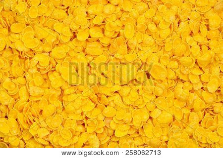 Corn-flakes Background And Texture. Top View. Cornflake Cereal Box For Morning Breakfast.