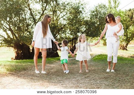 A Large Family With Homosexual Parents. Two Mothers.