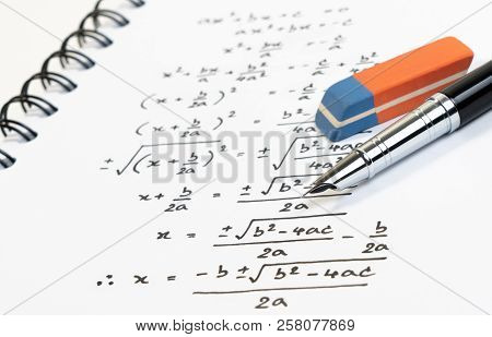 Handwriting Of Mathematics Quadratic Equation Formula On Examination, Practice, Quiz Or Test In Math