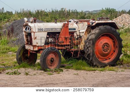 Norfolk, England - 06 Sept. 2010 :  David Brown Tractor Left To Rust Away In A Norfolk Field.