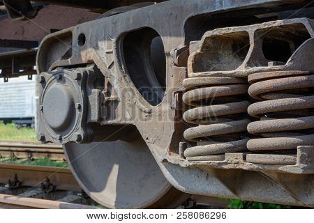 Wheel And Railway Wagon Spring Day. Rails