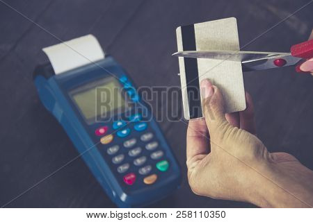 Credit Card Machine/payment Terminal Insulated With Cutting Concept Of Credit Card And Scissors. Foc